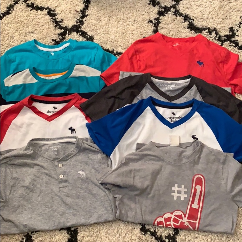 24 boys size large short sleeve shirts
